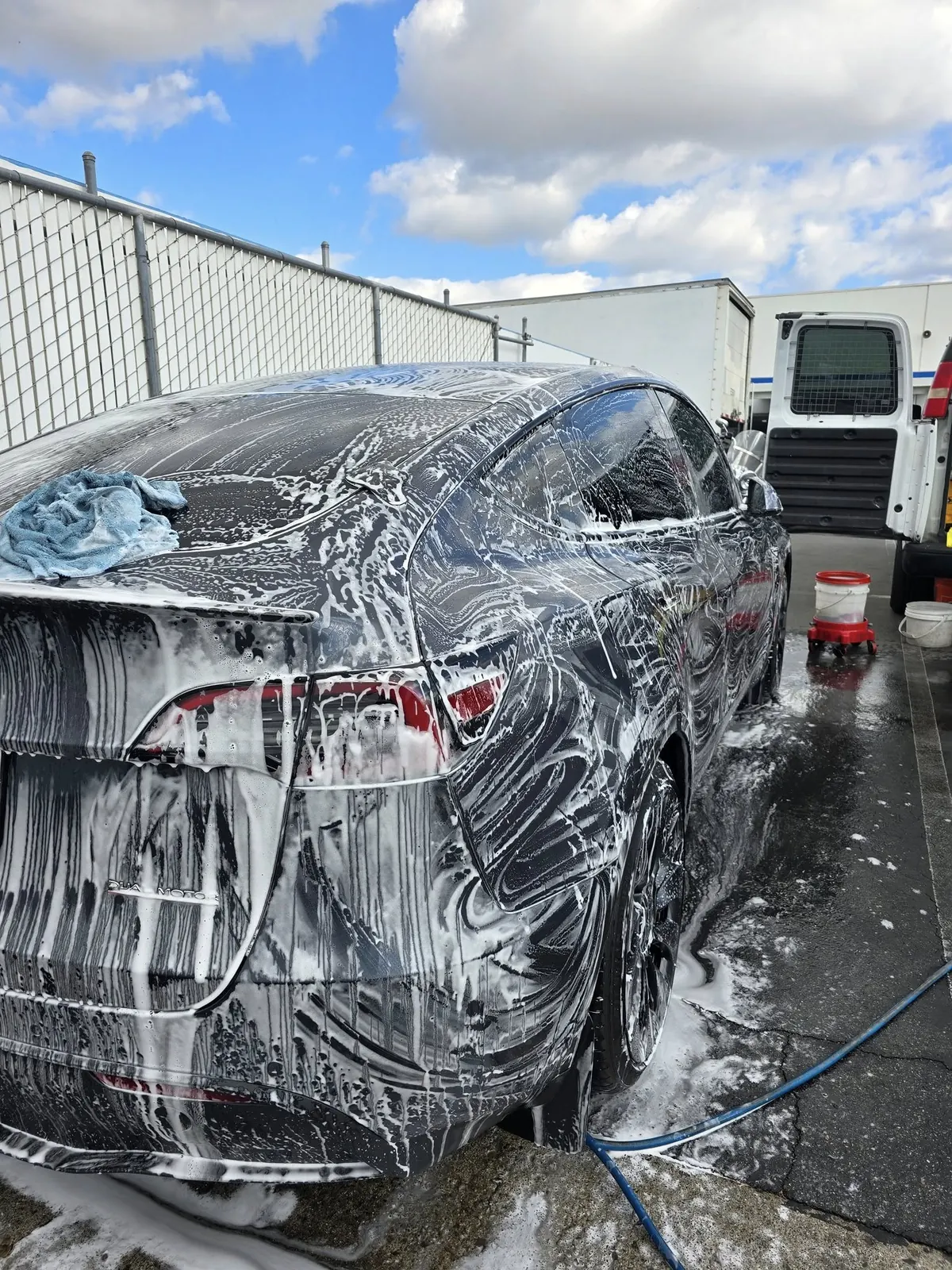 Tesla covered in foam during wash