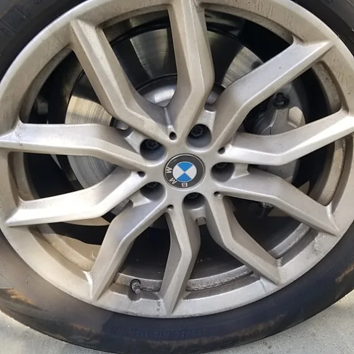 Dirty BMW wheel before cleaning